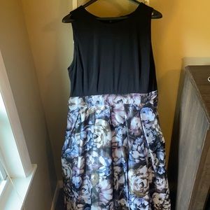 Dress with high-low tulle bottom and tie back